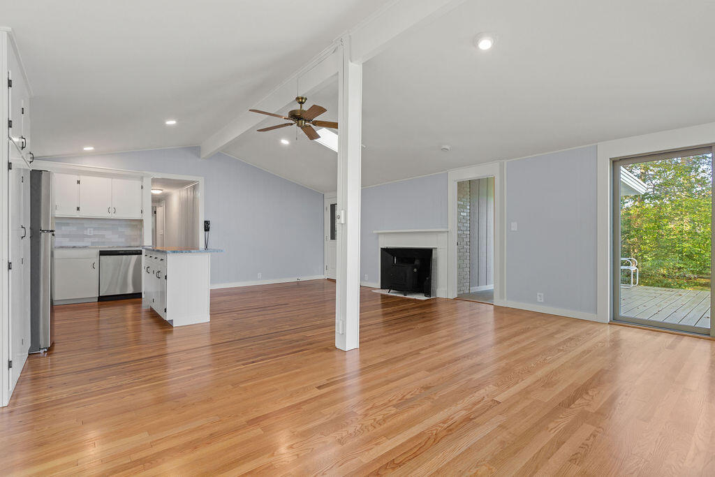 35 Santuit Lane Mashpee, MA 02649 - Photo 29 of 51 a view of a kitchen with a sink and a fireplace