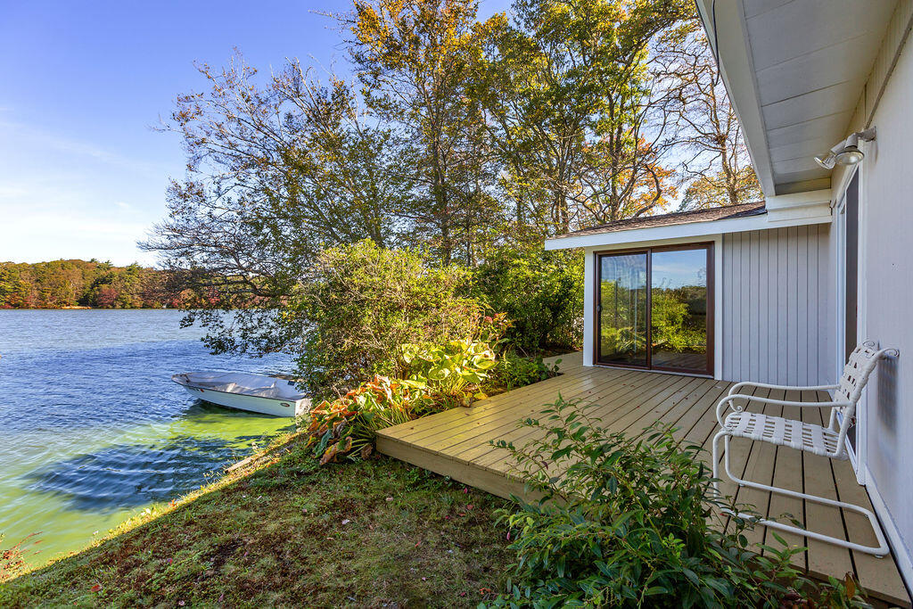 35 Santuit Lane Mashpee, MA 02649 - Photo 3 of 51 a view of backyard with plants and outdoor seating