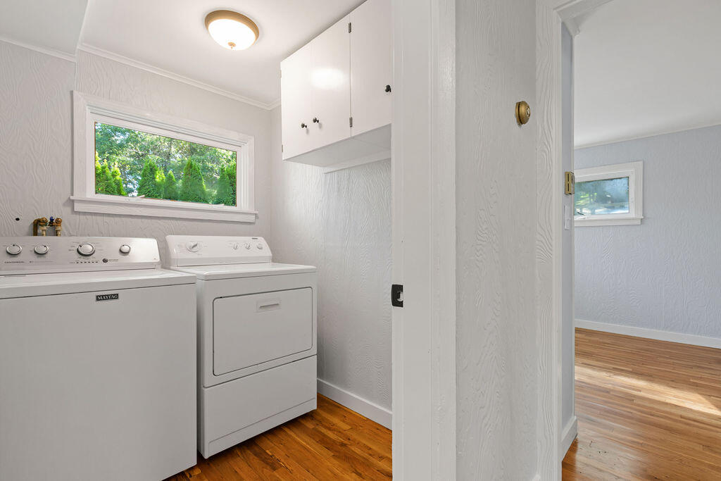 35 Santuit Lane Mashpee, MA 02649 - Photo 35 of 51 a bathroom with a sink a window and a mirror
