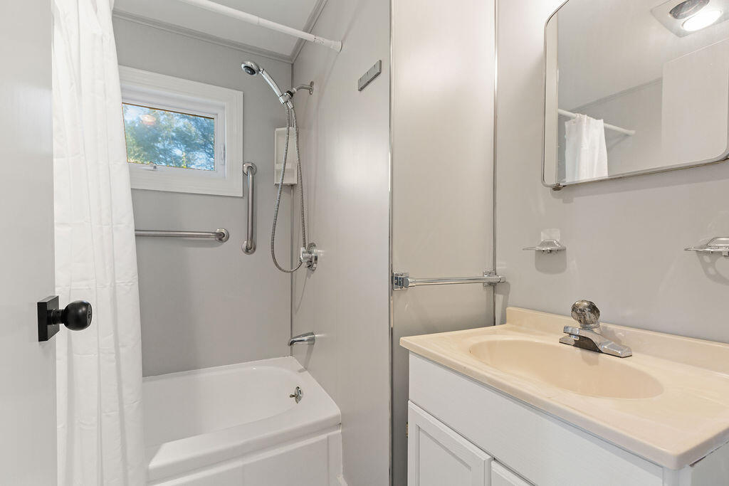 35 Santuit Lane Mashpee, MA 02649 - Photo 36 of 51 a bathroom with a sink a toilet and shower