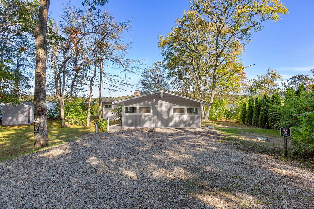 35 Santuit Lane Mashpee, MA 02649 - Photo 43 of 51 a view of a house with a yard