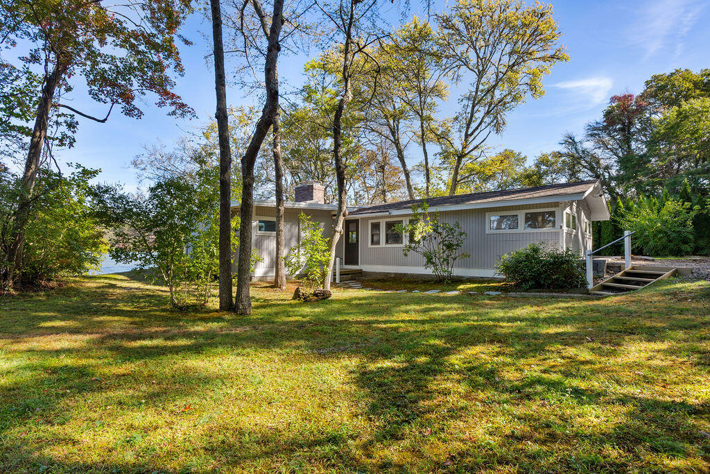 35 Santuit Lane Mashpee, MA 02649 - Photo 49 of 51 a view of a house with a yard