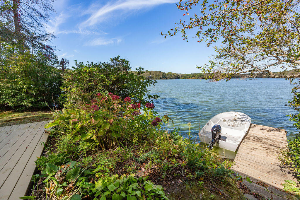 35 Santuit Lane Mashpee, MA 02649 - Photo 5 of 51 a aerial view of a house with a yard and large tree