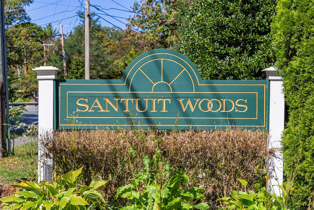 35 Santuit Lane Mashpee, MA 02649 - Photo 51 of 51 a sign that is on the side of a building