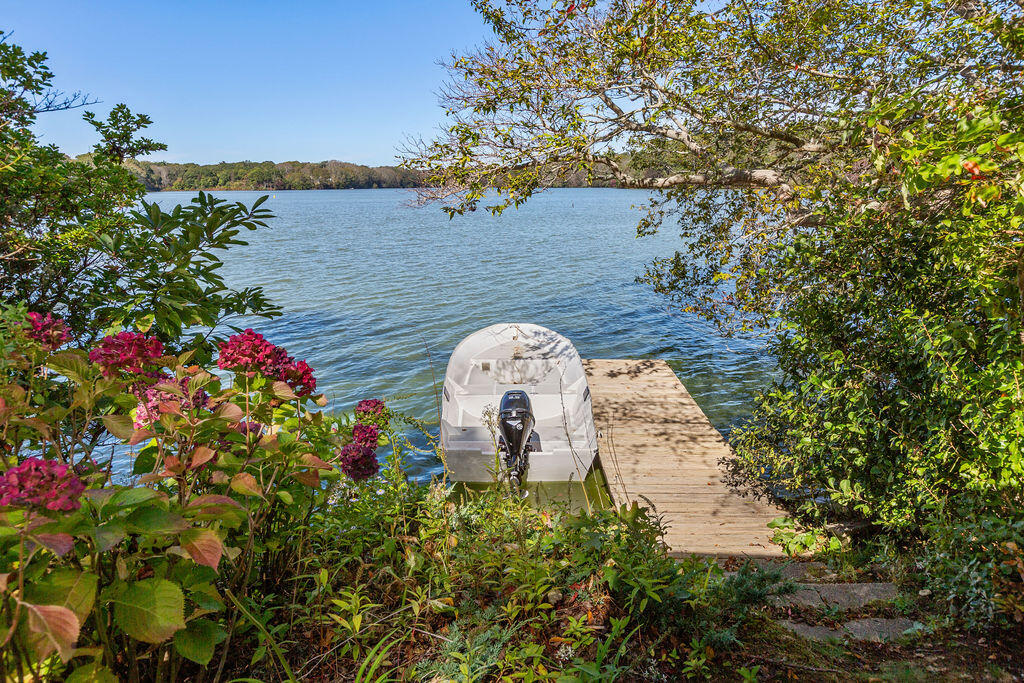 35 Santuit Lane Mashpee, MA 02649 - Photo 6 of 51 a aerial view of a house with a lake view