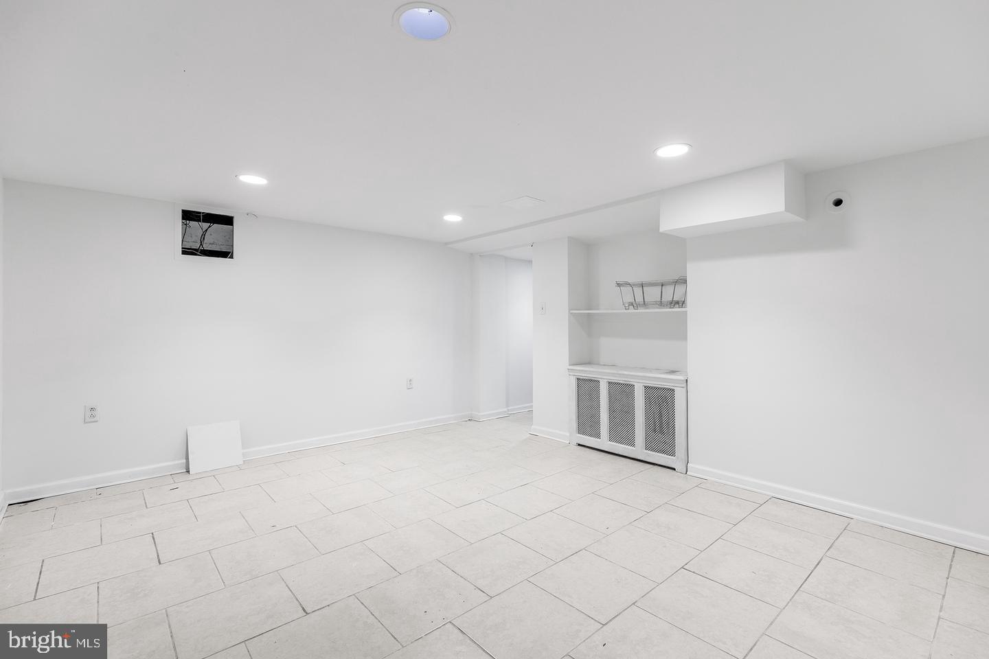103 Llandaff Road Havertown, PA 19083 - Photo 17 of 36 an empty room with cabinet and projector