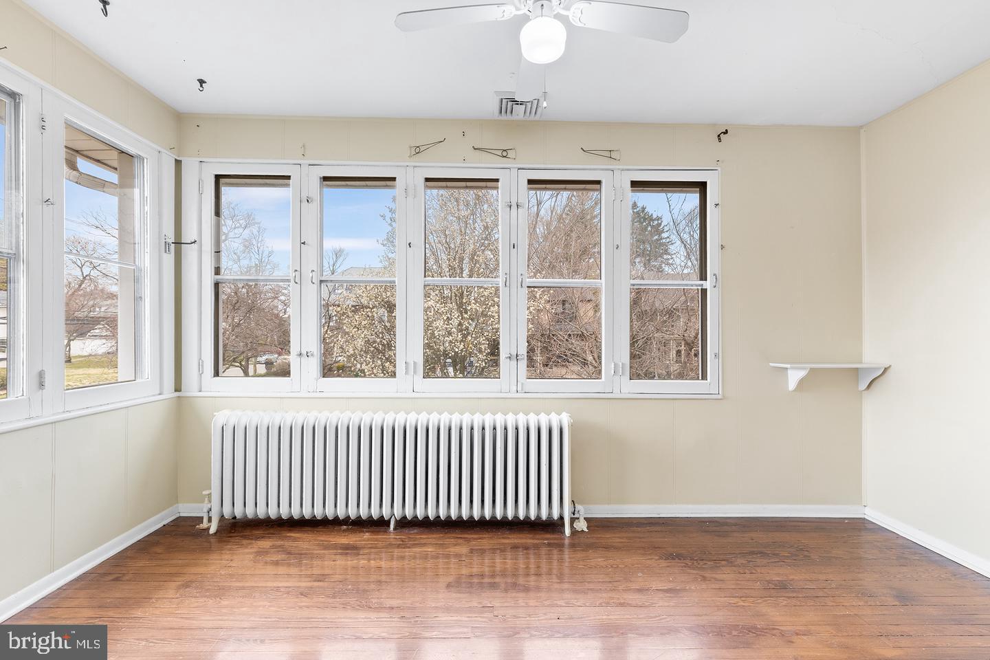 103 Llandaff Road Havertown, PA 19083 - Photo 22 of 36 an empty room with wooden floor and windows
