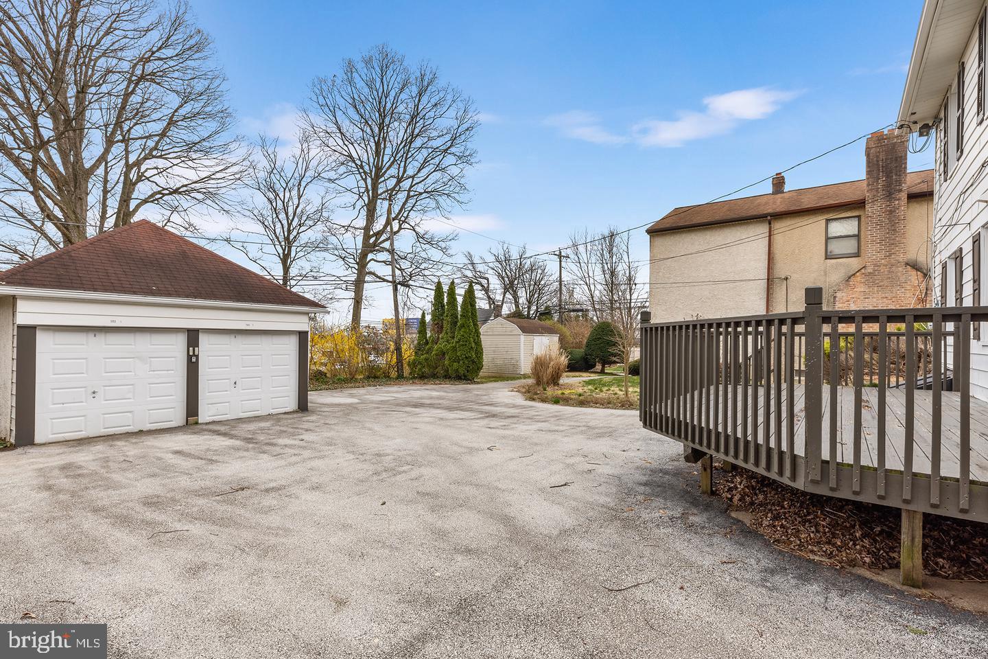 103 Llandaff Road Havertown, PA 19083 - Photo 31 of 36 a view of a house with a yard and fence