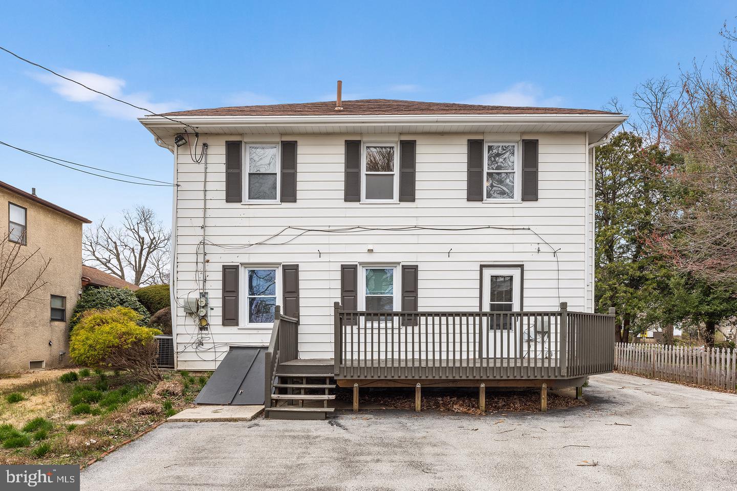 103 Llandaff Road Havertown, PA 19083 - Photo 32 of 36 a view of a house with a deck and furniture