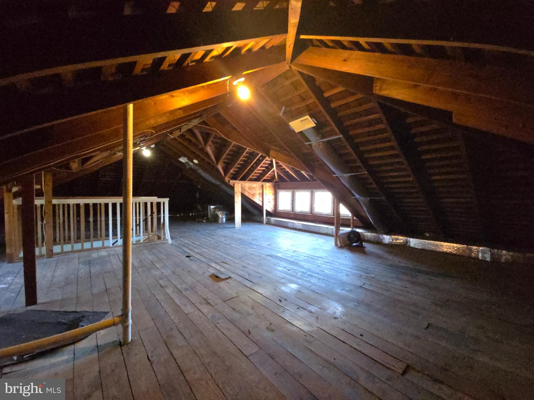 103 Llandaff Road Havertown, PA 19083 - Photo 35 of 36 a view of an empty room with wooden floor