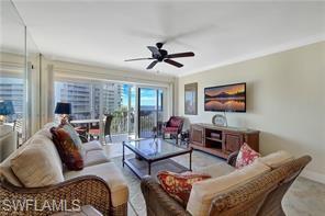 1 Bluebill Avenue, Unit 707 Naples, FL 34108 - Photo 12 of 16 Living room with ceiling fan