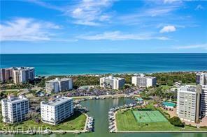1 Bluebill Avenue, Unit 707 Naples, FL 34108 - Photo 2 of 16 Drone / aerial view with a water view