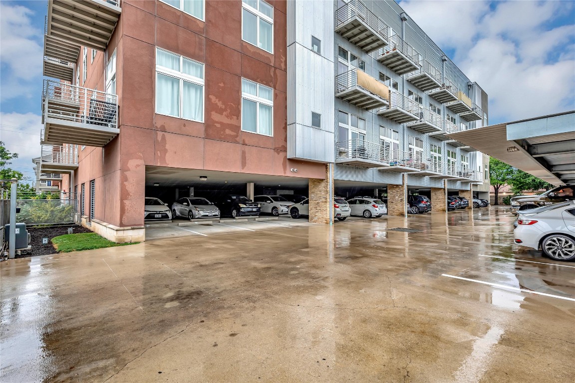 2124 East 6th Street, Unit 305 Austin, TX 78702 - Photo 30 of 35 a view of a building with a swimming pool