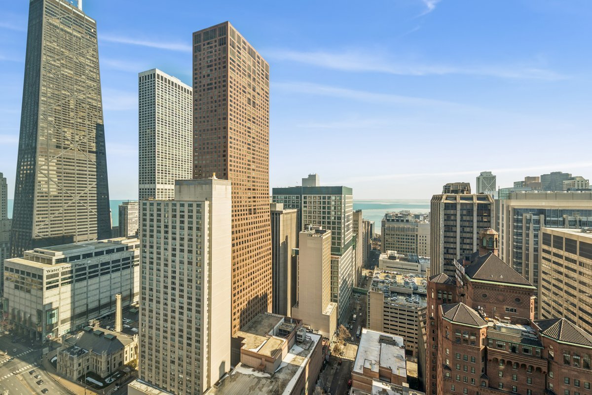 100 East Huron Street, Unit 2903 Chicago, IL 60611 - Photo 5 of 17 a view of city with tall buildings