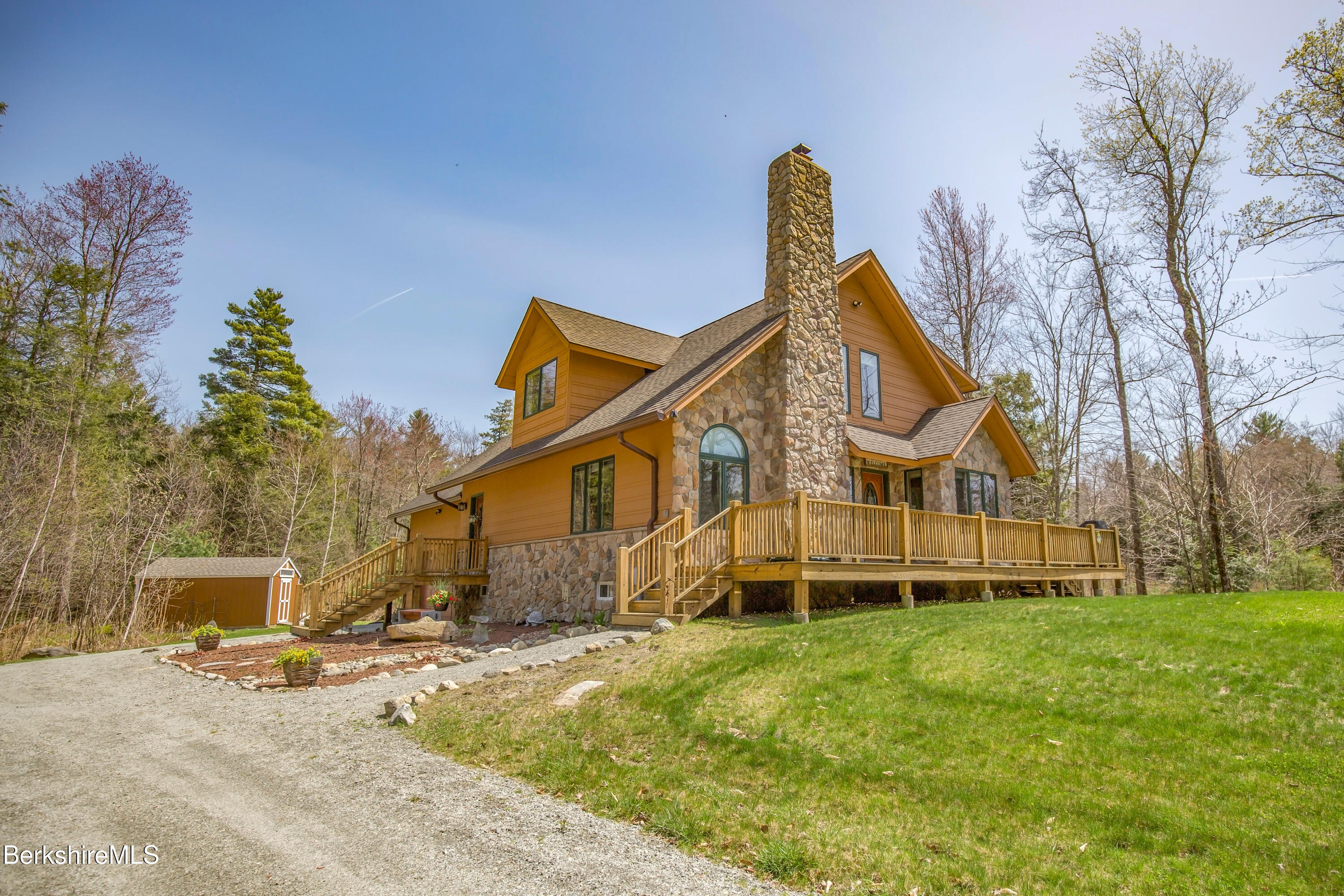 24 Evergreen Drive Otis, MA 01253 - Photo 2 of 41 a view of a house with a yard