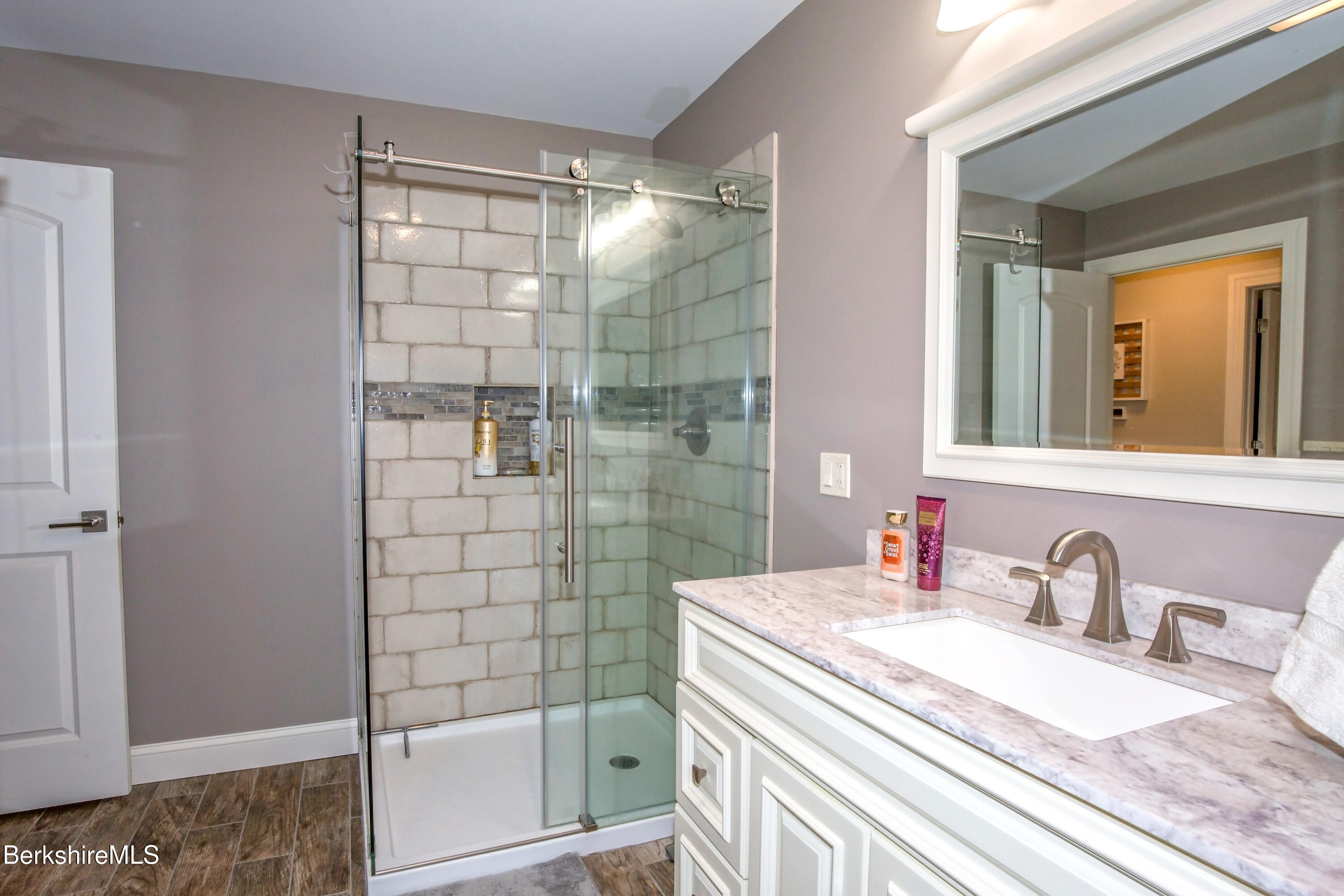 24 Evergreen Drive Otis, MA 01253 - Photo 26 of 41 a bathroom with a sink and a mirror