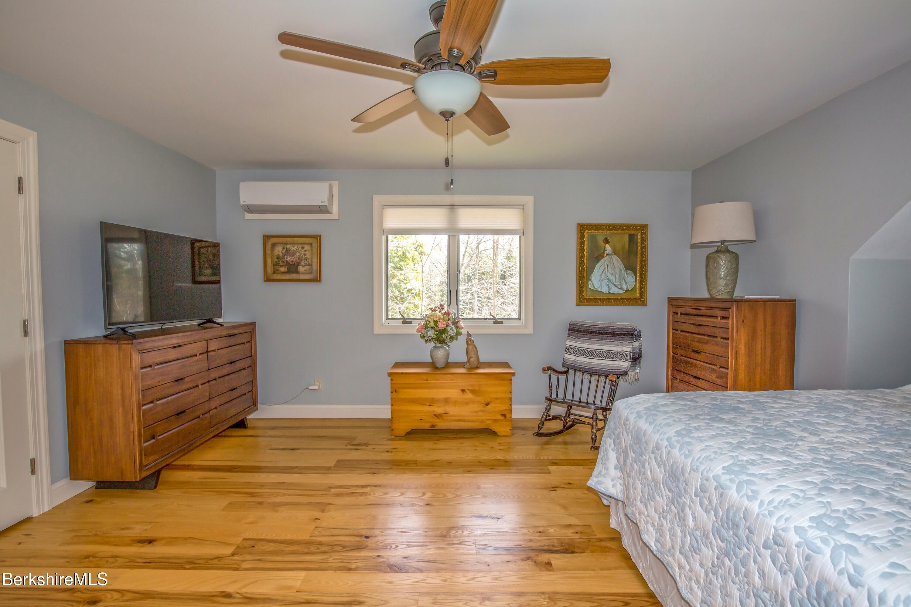 24 Evergreen Drive Otis, MA 01253 - Photo 32 of 41 a bedroom with a bed and wooden floor