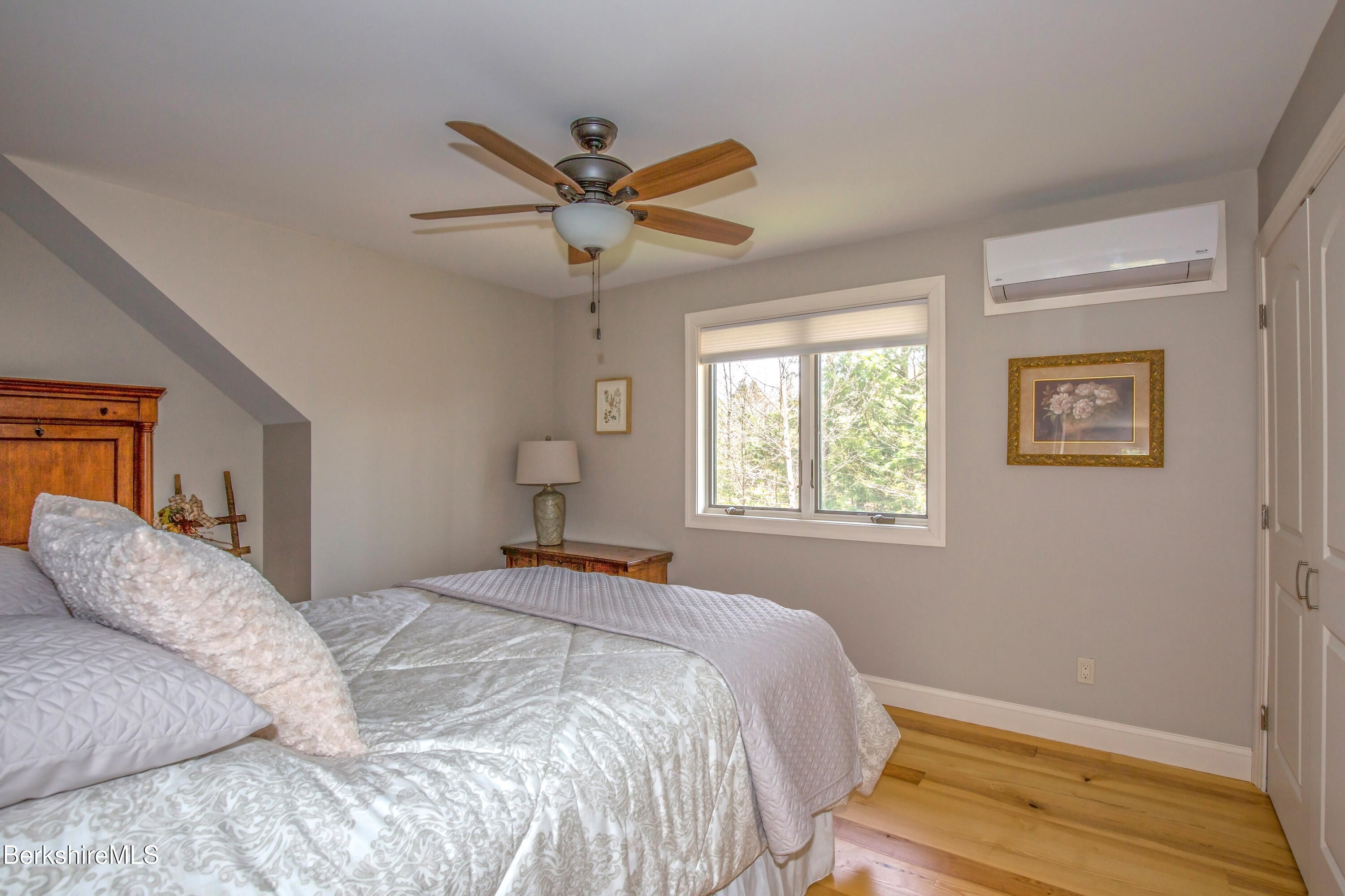 24 Evergreen Drive Otis, MA 01253 - Photo 33 of 41 a bedroom with a bed and a window
