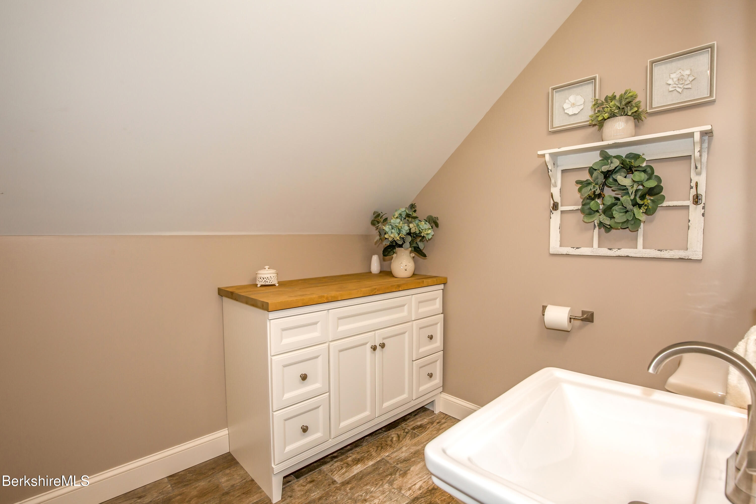 24 Evergreen Drive Otis, MA 01253 - Photo 35 of 41 a bathroom with a toilet sink and mirror