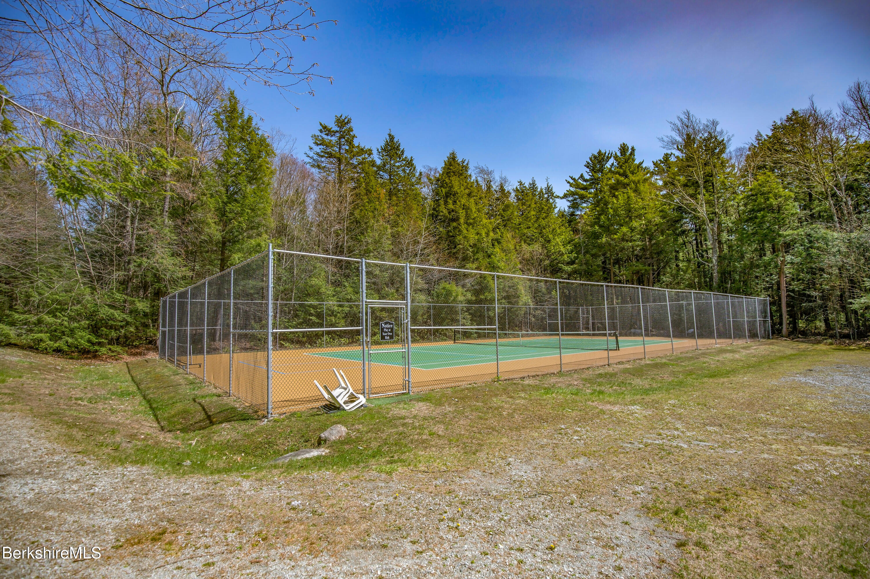 24 Evergreen Drive Otis, MA 01253 - Photo 38 of 41 a view of a backyard with a small yard