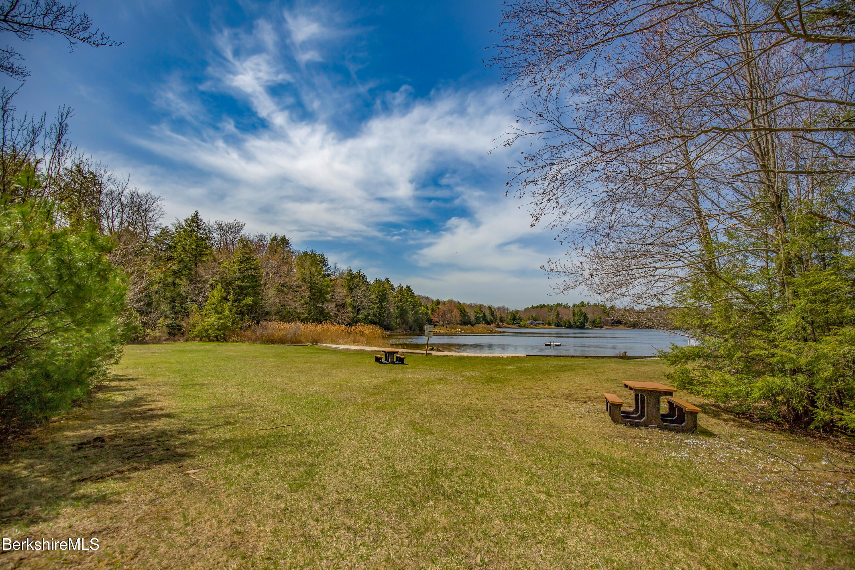 24 Evergreen Drive Otis, MA 01253 - Photo 39 of 41 a view of a swimming pool and an outdoor seating