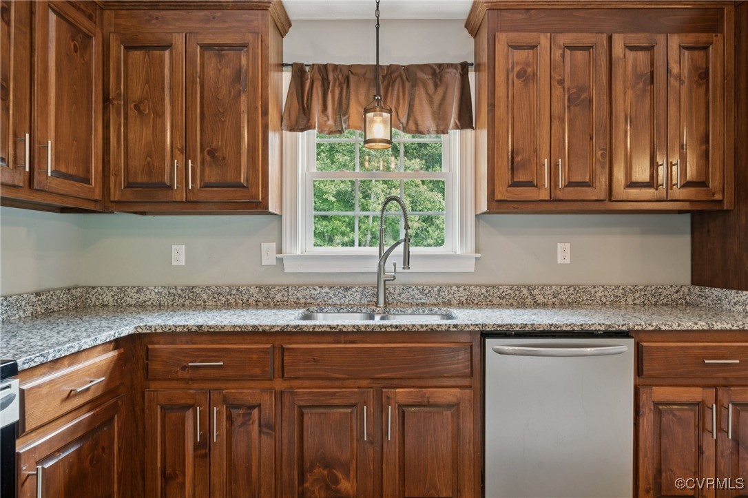 241 Deep Landing Road Tappahannock, VA 22560 - Photo 13 of 33 Kitchen with dishwasher, a sink, hanging light fix