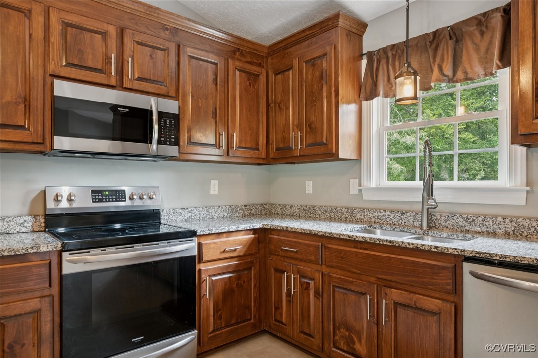 241 Deep Landing Road Tappahannock, VA 22560 - Photo 14 of 33 Kitchen with appliances with stainless steel finis