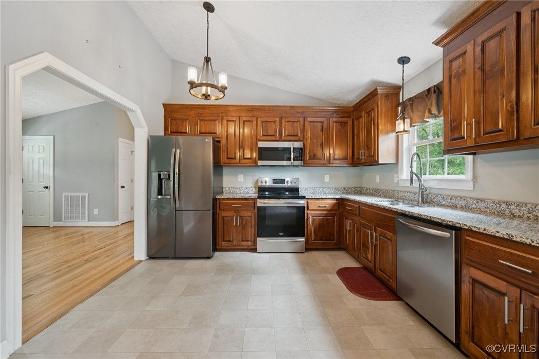 241 Deep Landing Road Tappahannock, VA 22560 - Photo 16 of 33 Kitchen with stainless steel appliances, a sink, l