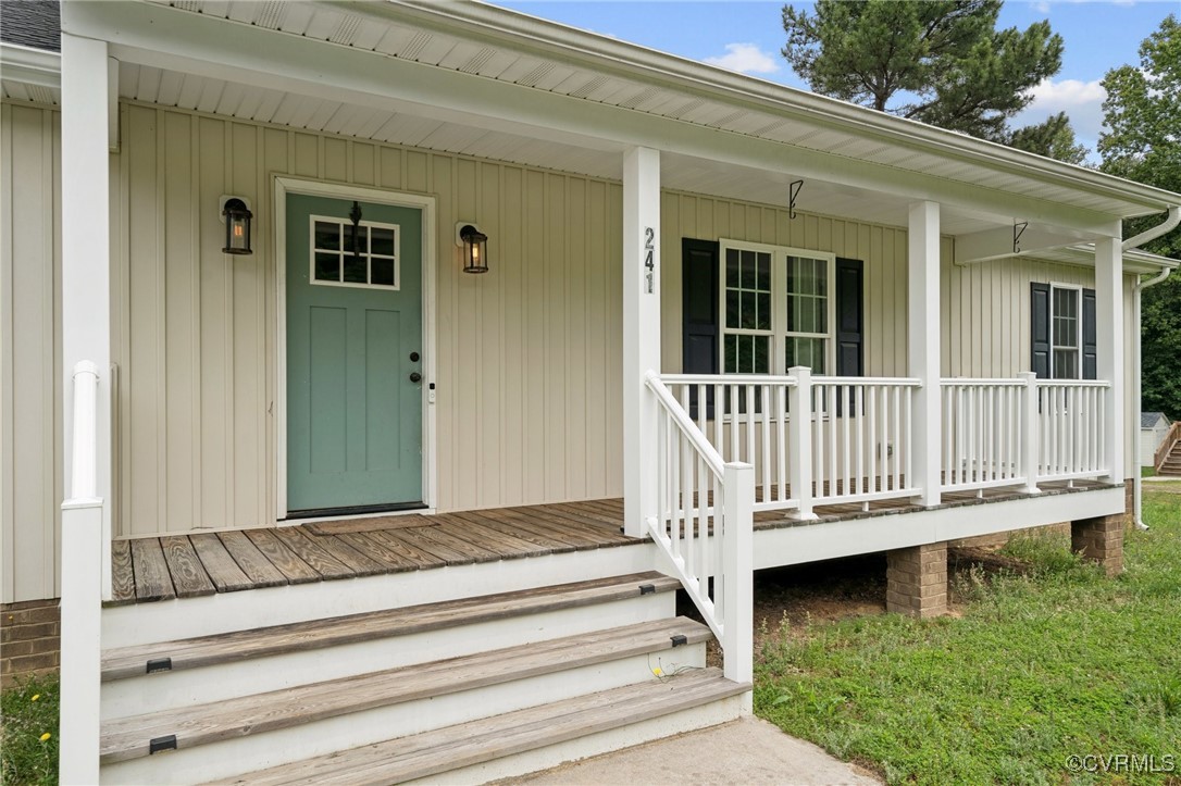 241 Deep Landing Road Tappahannock, VA 22560 - Photo 2 of 33 View of exterior entry with a porch