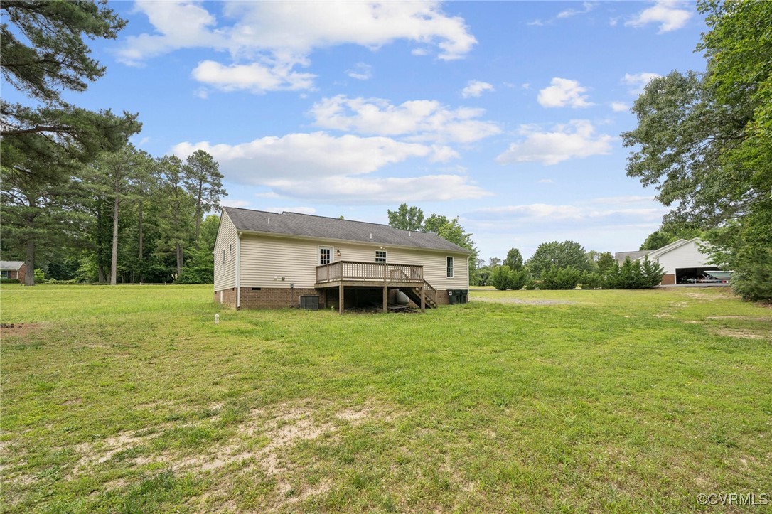 241 Deep Landing Road Tappahannock, VA 22560 - Photo 31 of 33 Rear view of property featuring a wooden deck, a l