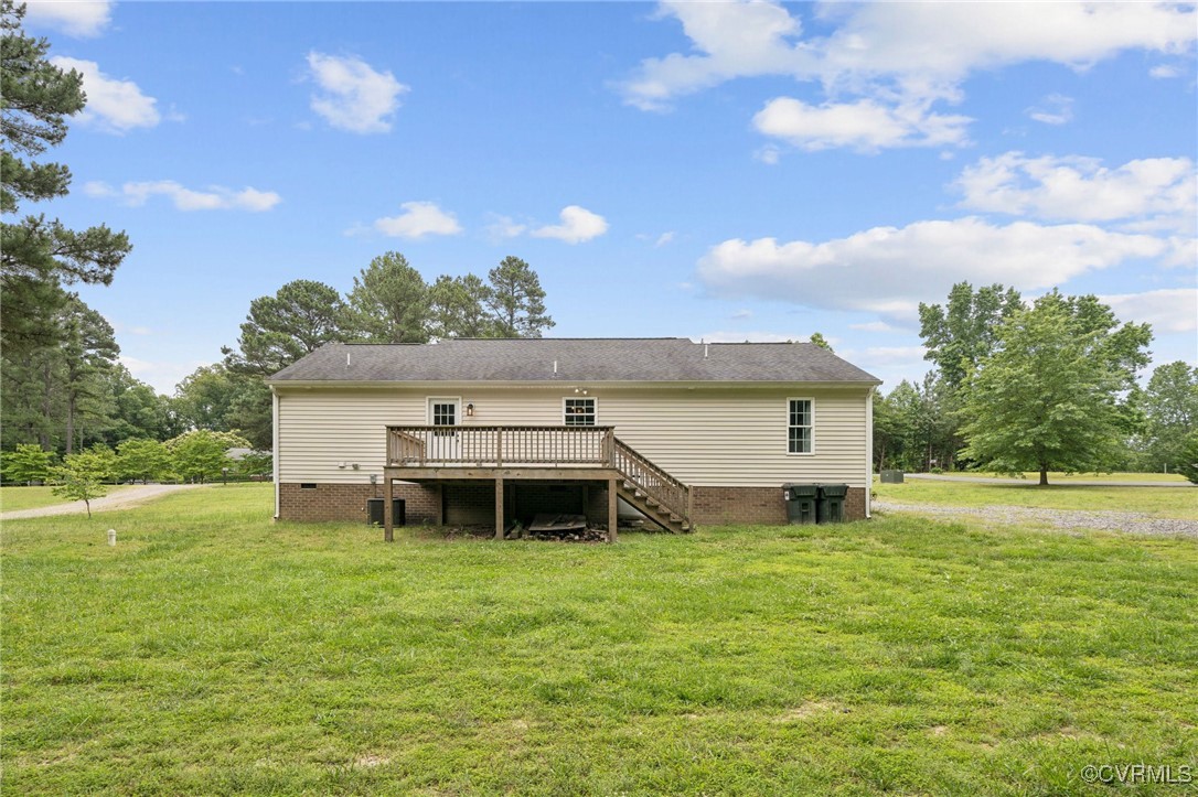241 Deep Landing Road Tappahannock, VA 22560 - Photo 32 of 33 Rear view of property with a wooden deck, crawl sp