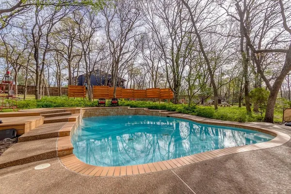 $900,000 | 140 Creekside Drive, Double Oak, TX 75077