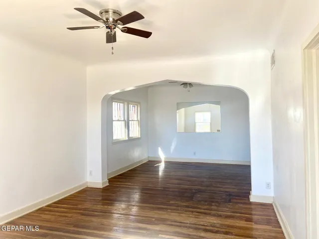 a view of an empty room and window