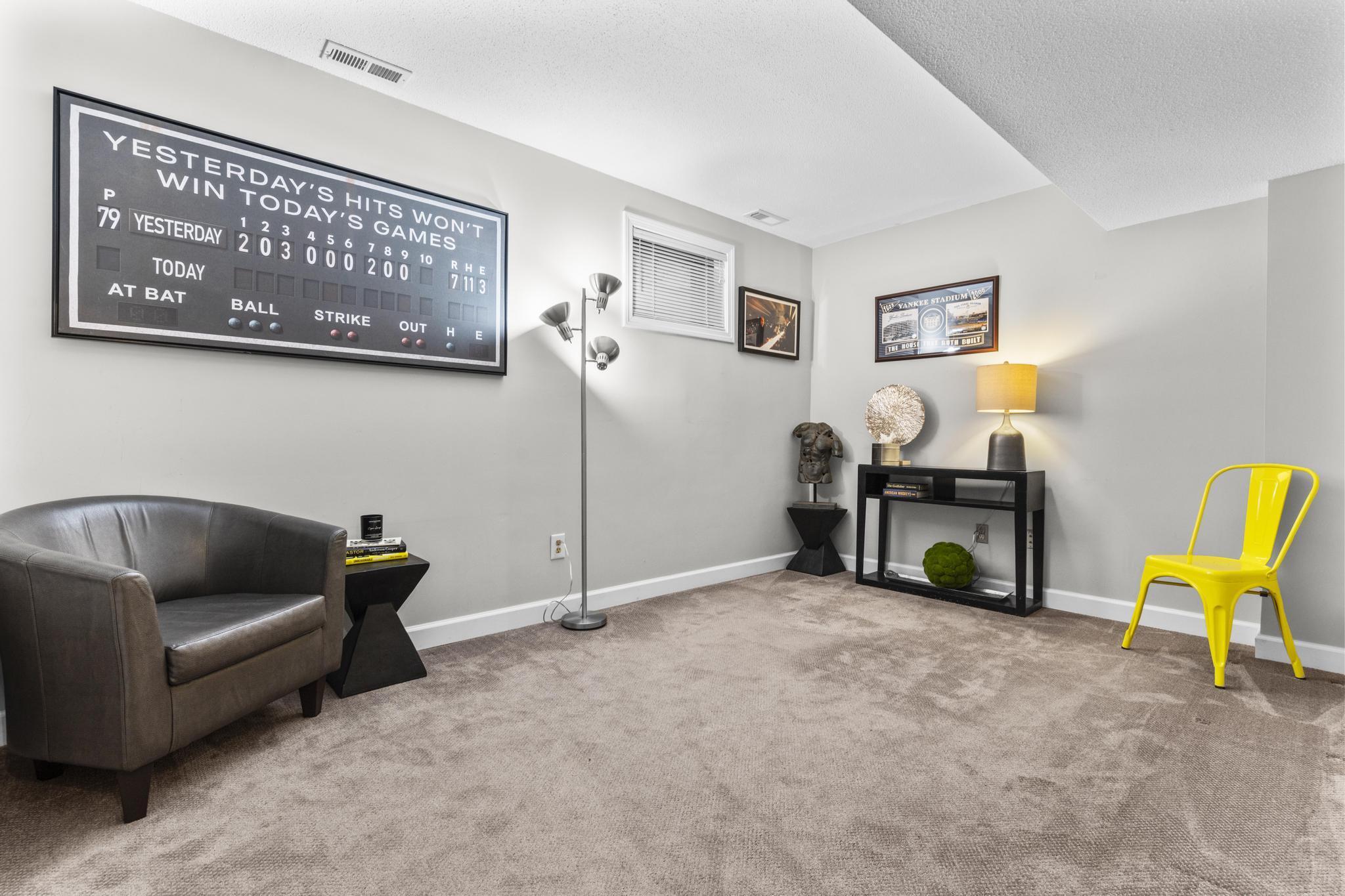 26 Summit Street, Unit 26 Derby, CT 06418 - Photo 13 of 35 a living room with furniture and a lamp