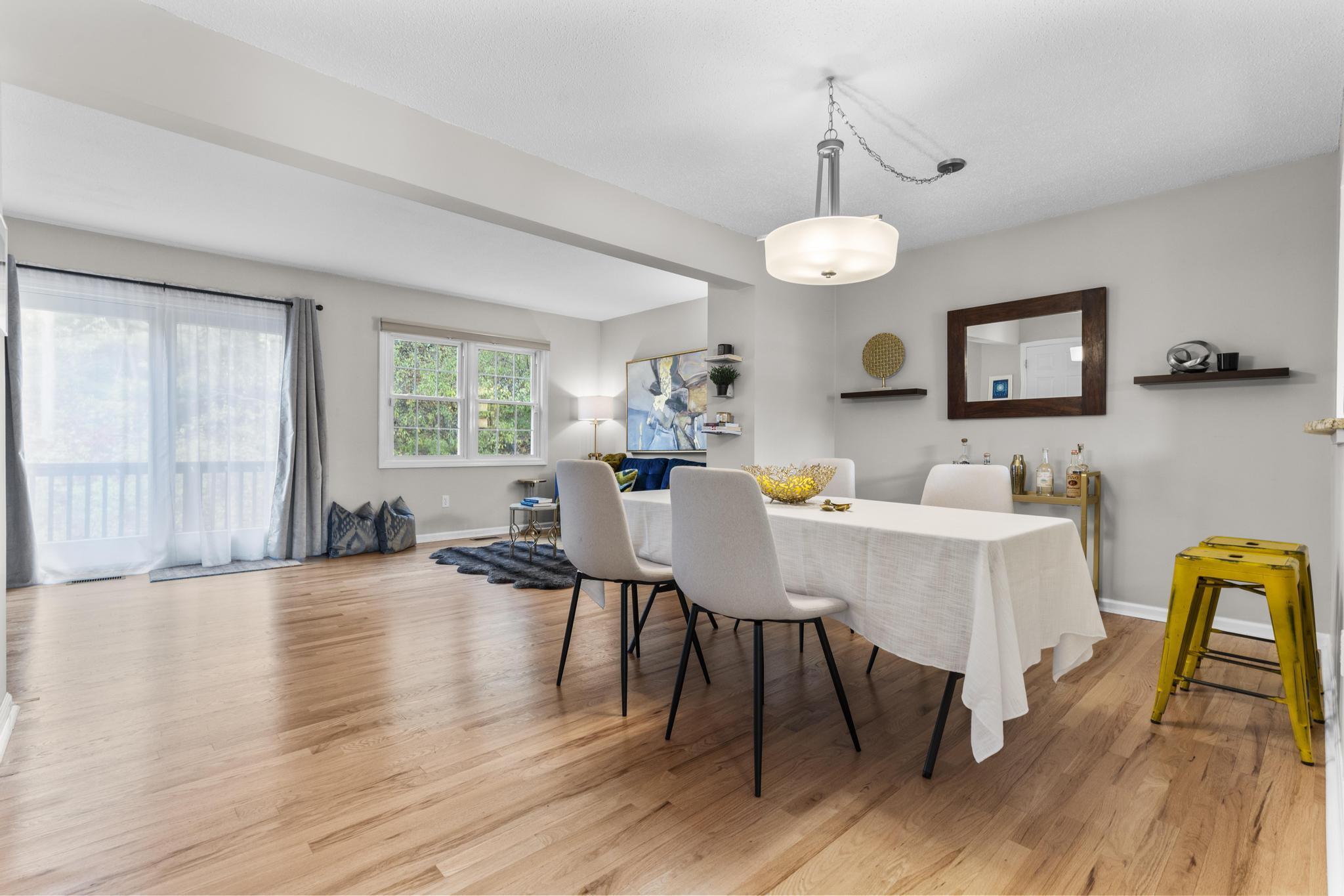 26 Summit Street, Unit 26 Derby, CT 06418 - Photo 16 of 35 a view of a dining room with furniture window and wooden floor