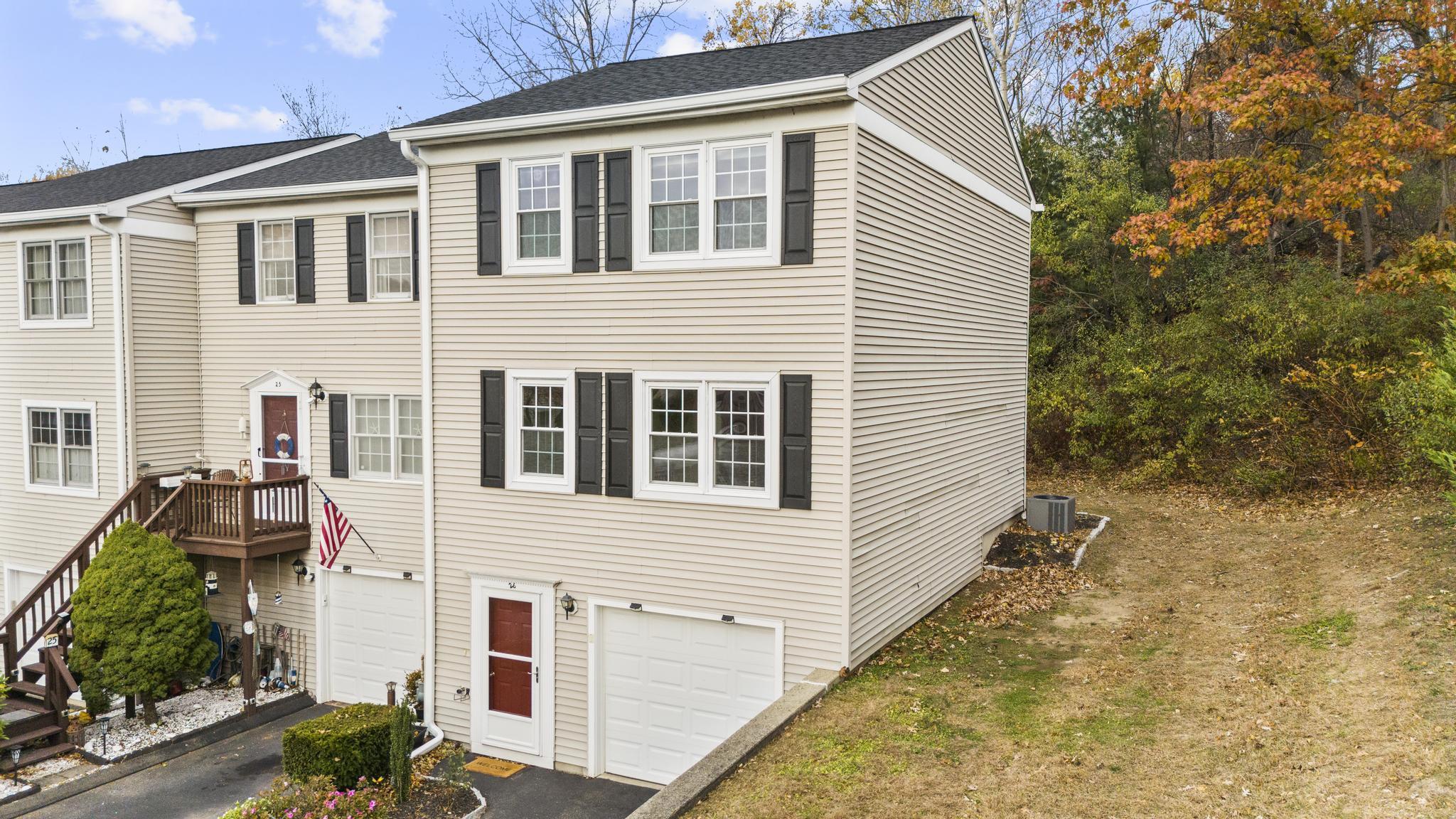 26 Summit Street, Unit 26 Derby, CT 06418 - Photo 2 of 35 a view of a house with a yard
