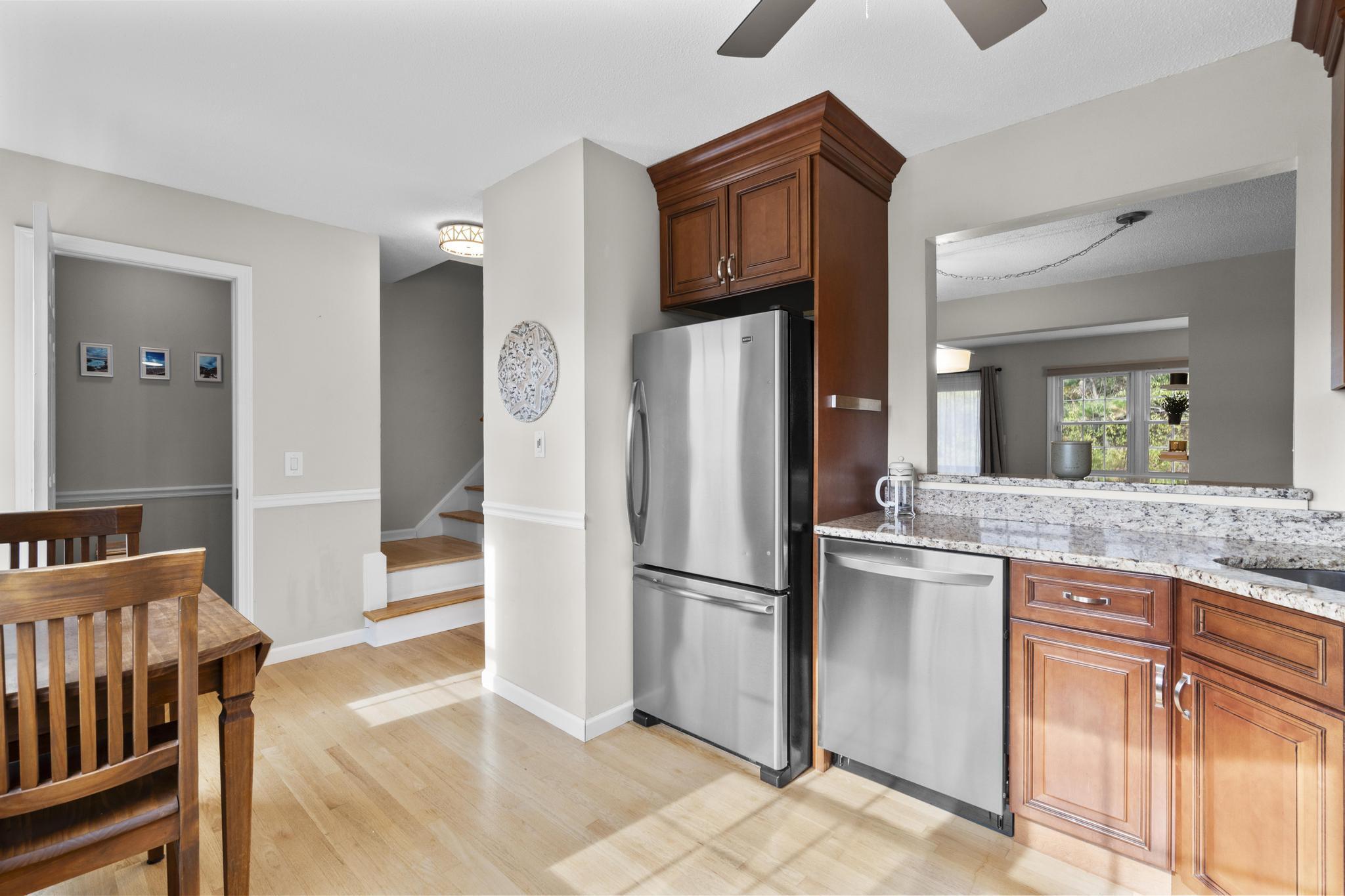 26 Summit Street, Unit 26 Derby, CT 06418 - Photo 22 of 35 a kitchen with stainless steel appliances granite countertop a refrigerator and a sink