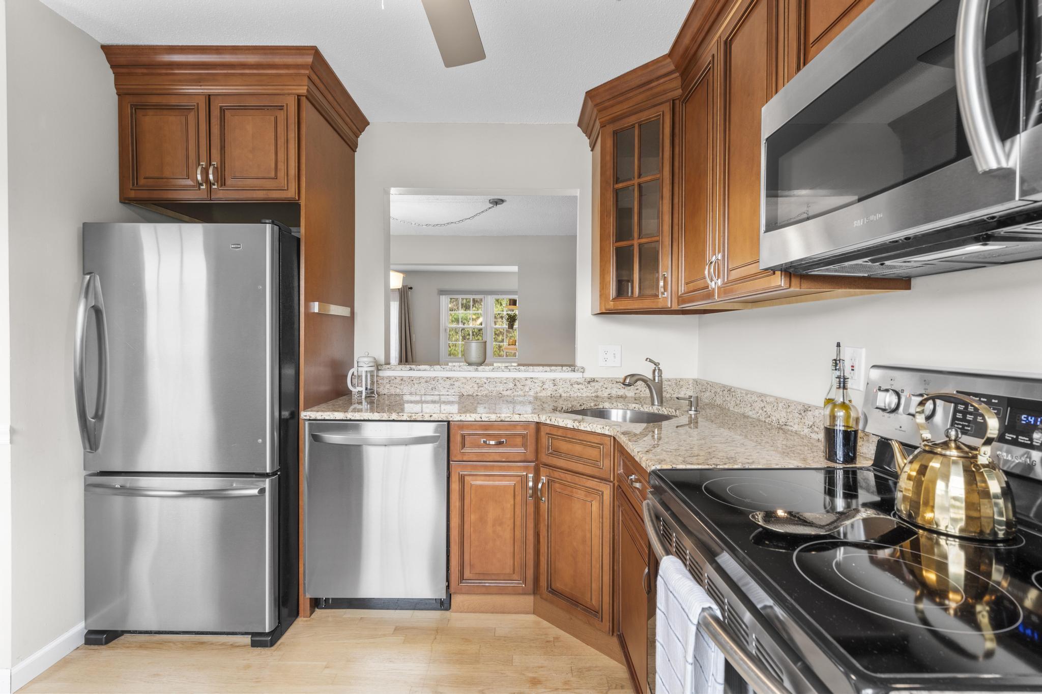 26 Summit Street, Unit 26 Derby, CT 06418 - Photo 23 of 35 a kitchen with a sink appliances and cabinets