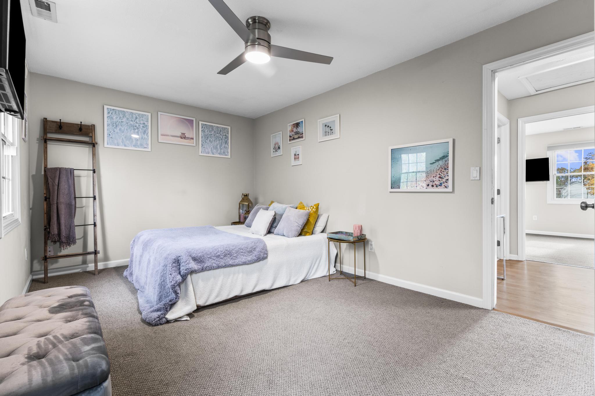 26 Summit Street, Unit 26 Derby, CT 06418 - Photo 26 of 35 a spacious bedroom with a bed and cabinets