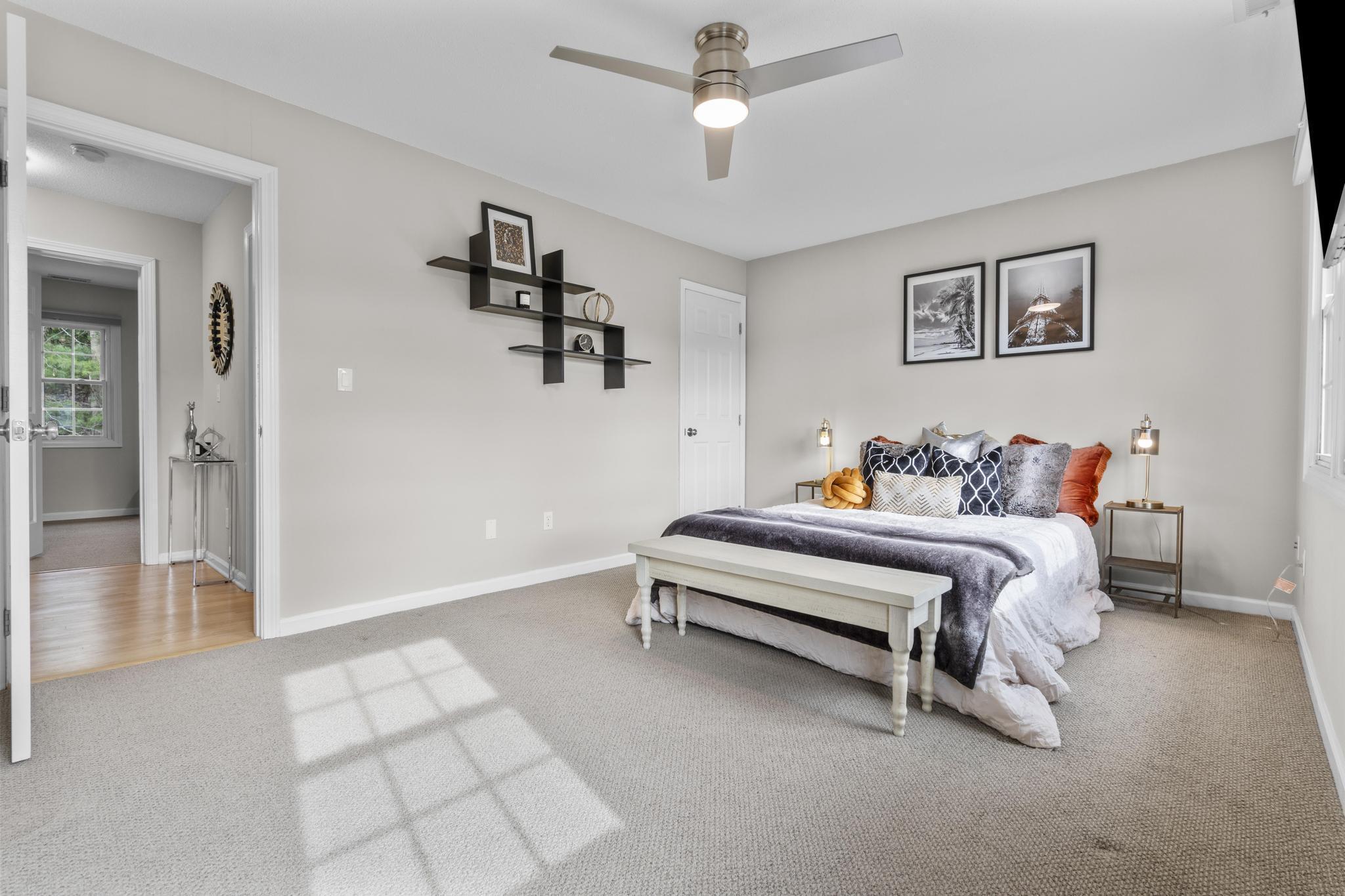 26 Summit Street, Unit 26 Derby, CT 06418 - Photo 30 of 35 a bedroom with a bed and a walk in closet