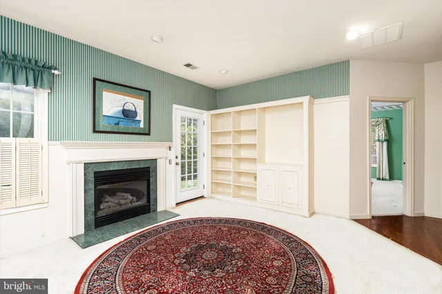 a living room with a fireplace