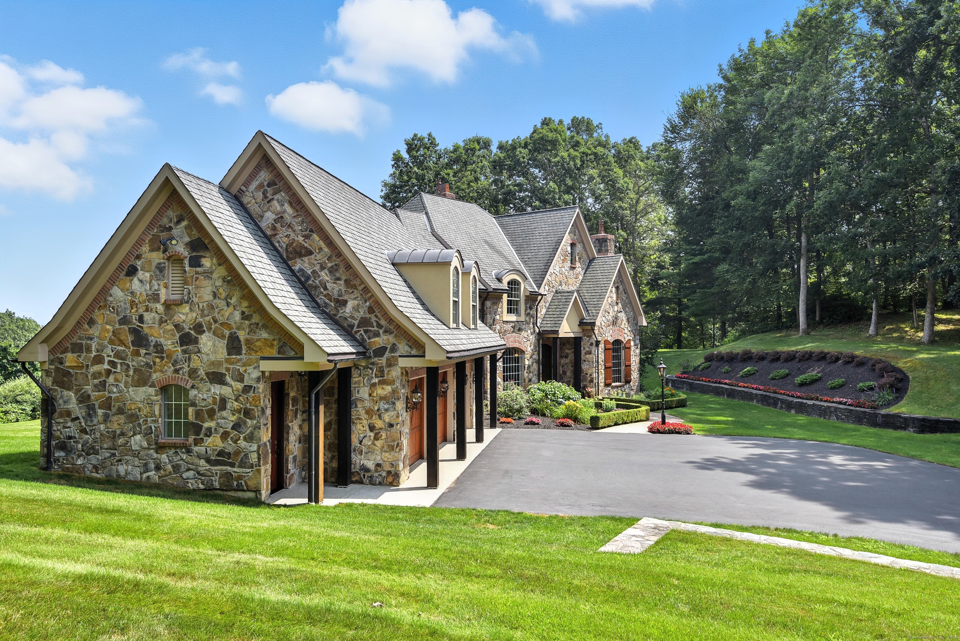 282 Searles Road Pomfret, CT 06259 - Photo 16 of 40 Ten-inch square solid red cedar columns. 50-year simulated slate asphalt shingles on multi-gabled roof.