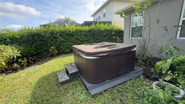 a view of a backyard with plants