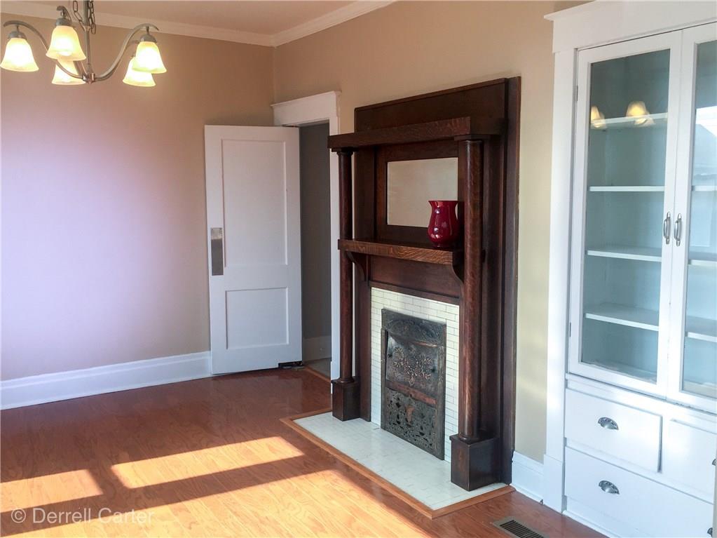 452 Ohio Avenue Rochester, PA 15074 - Photo 8 of 17 Dining room with built ins and a beautiful mantel.