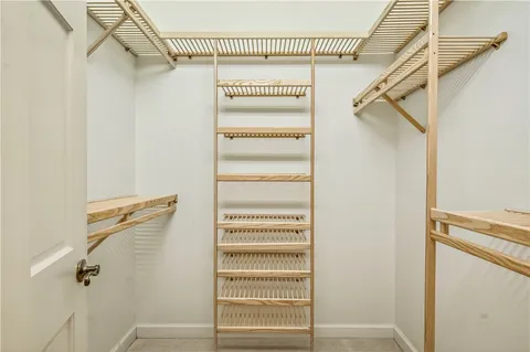 a view of a room with racks on the wall