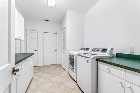 a kitchen with a stove and a sink
