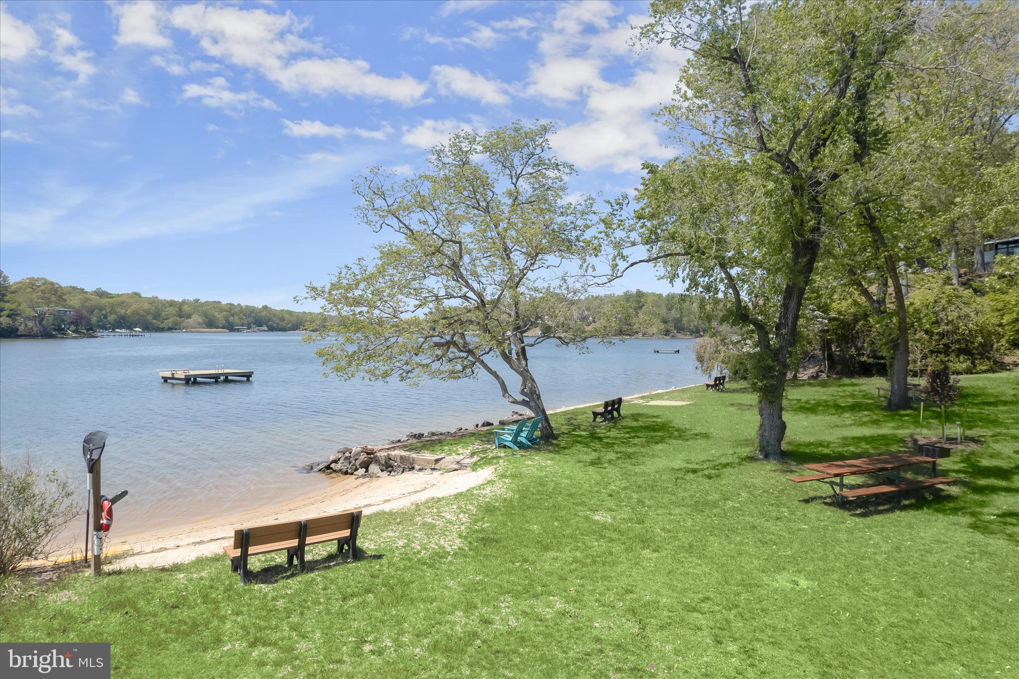620 Jumpers Hole Road Severna Park, MD 21146 - Photo 110 of 112 a view of a lake with a yard and sitting area