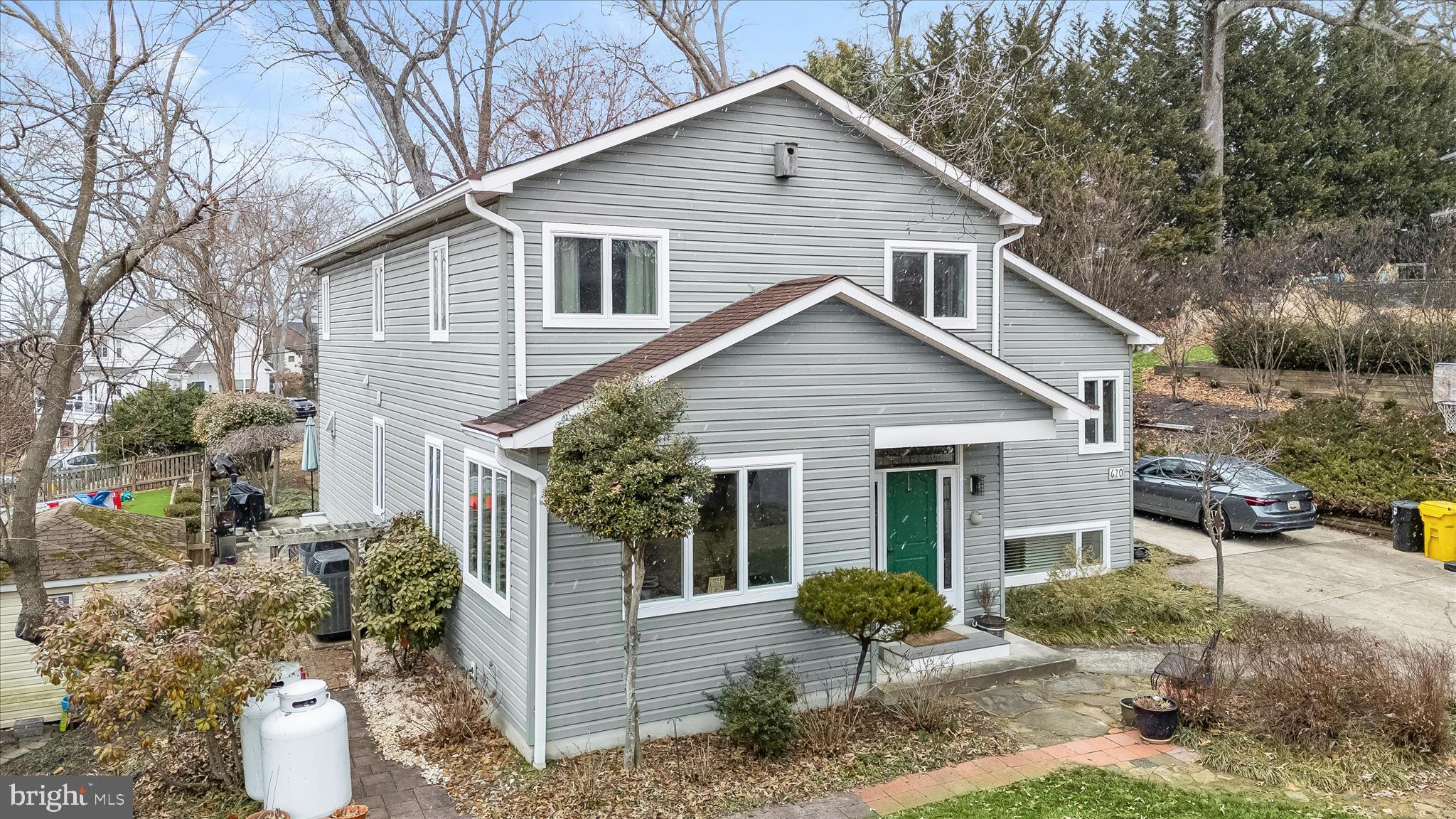 620 Jumpers Hole Road Severna Park, MD 21146 - Photo 2 of 43 a view of a house with a yard and potted plants