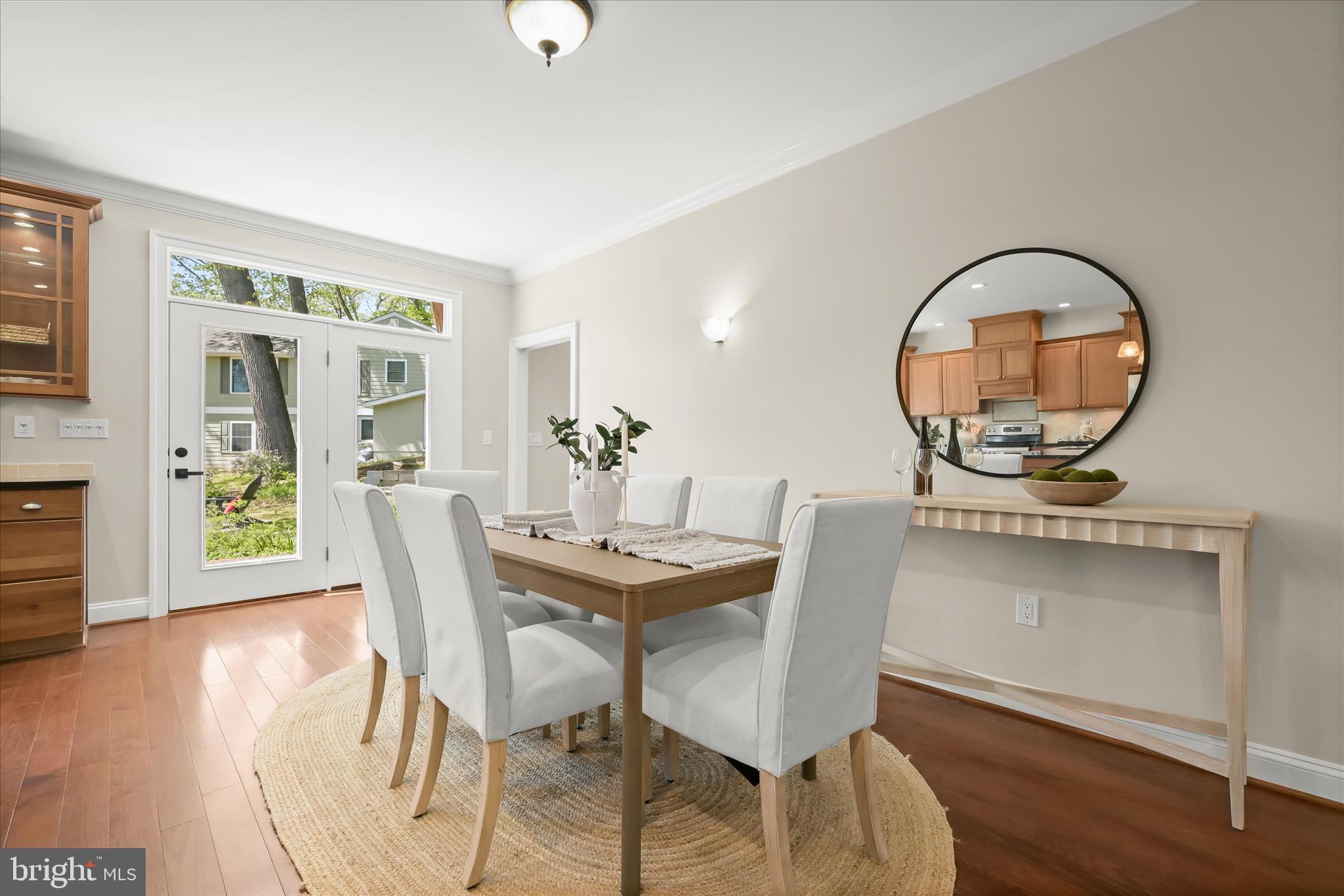 620 Jumpers Hole Road Severna Park, MD 21146 - Photo 34 of 112 a view of a dining room with furniture and wooden floor