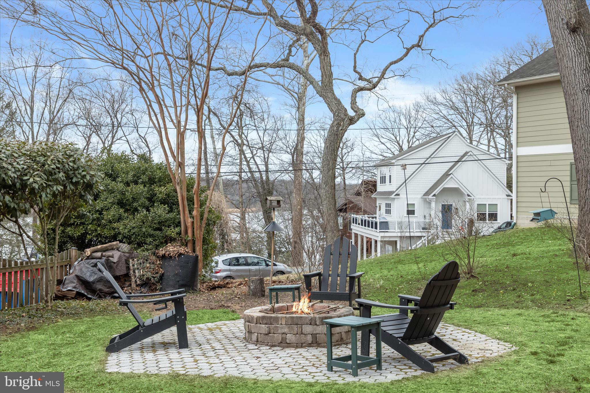 620 Jumpers Hole Road Severna Park, MD 21146 - Photo 37 of 112 a view of a chairs and table in backyard of the house